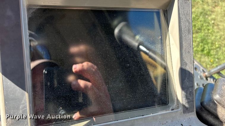 image for item ED2302 1999 Caterpillar Lexion 465 RWA combine