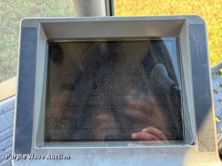 image for item ED2302 1999 Caterpillar Lexion 465 RWA combine