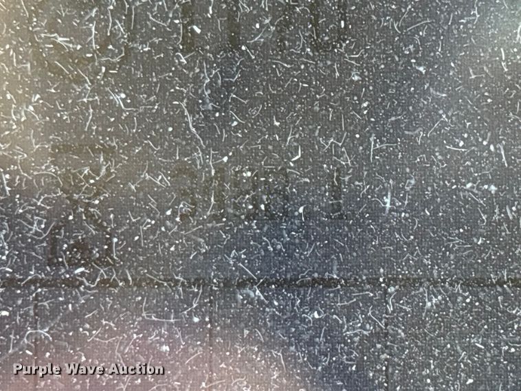 image for item ED2302 1999 Caterpillar Lexion 465 RWA combine