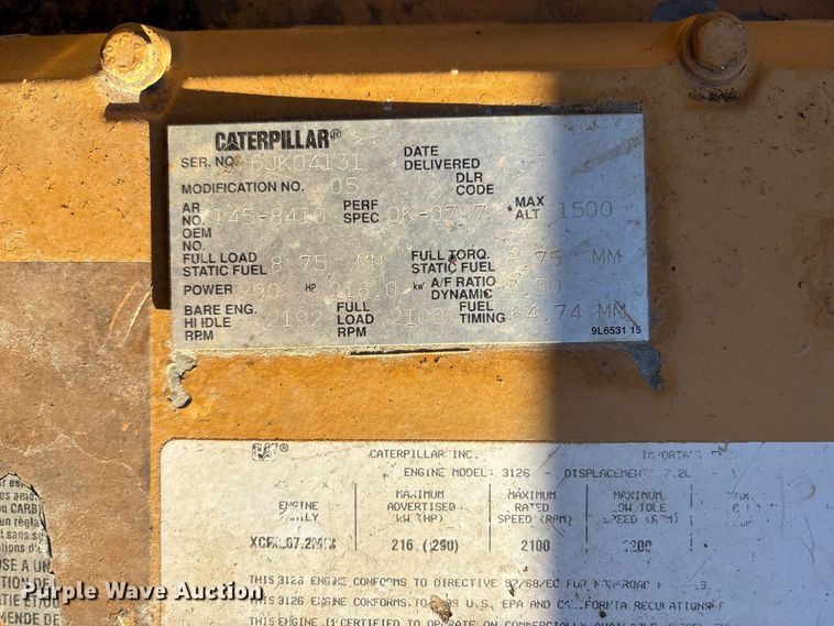 image for item ED2302 1999 Caterpillar Lexion 465 RWA combine