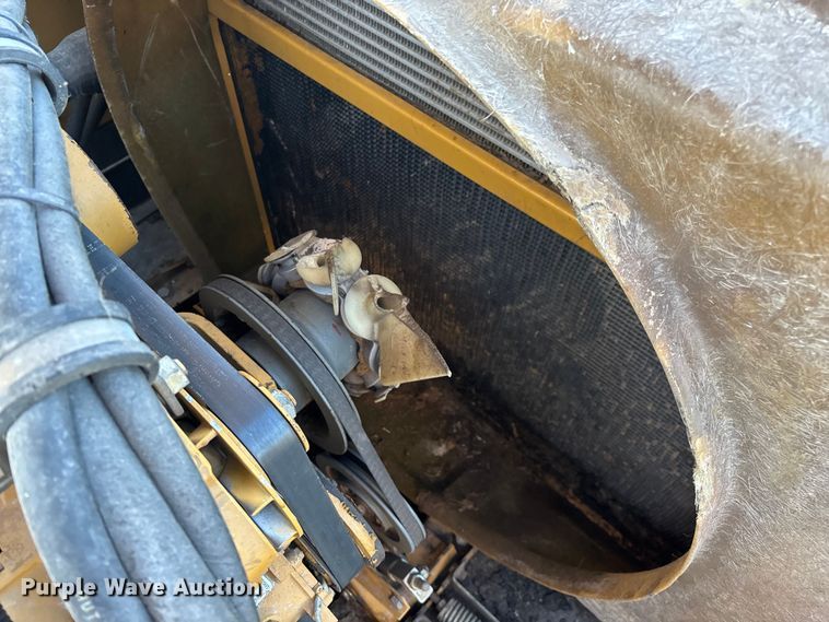 image for item ED2302 1999 Caterpillar Lexion 465 RWA combine