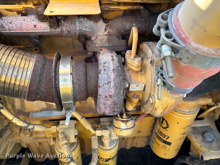 image for item ED2302 1999 Caterpillar Lexion 465 RWA combine