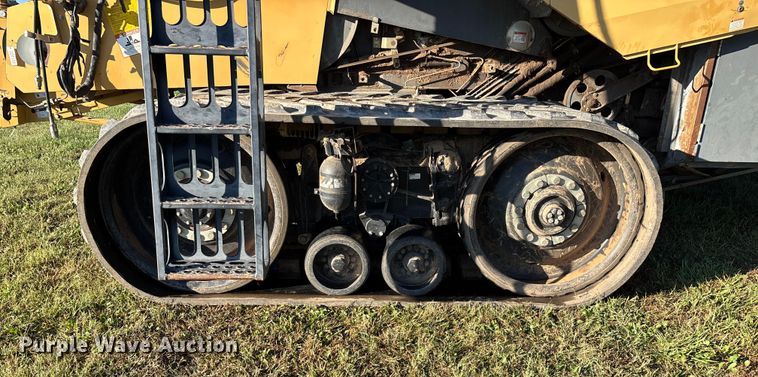 image for item ED2302 1999 Caterpillar Lexion 465 RWA combine