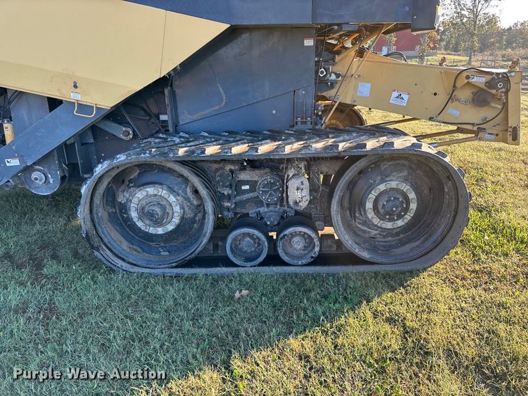 image for item ED2302 1999 Caterpillar Lexion 465 RWA combine