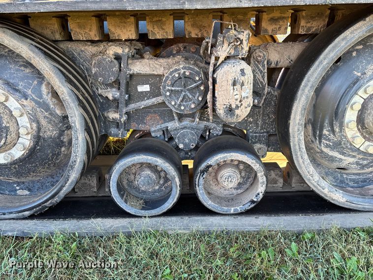 image for item ED2302 1999 Caterpillar Lexion 465 RWA combine