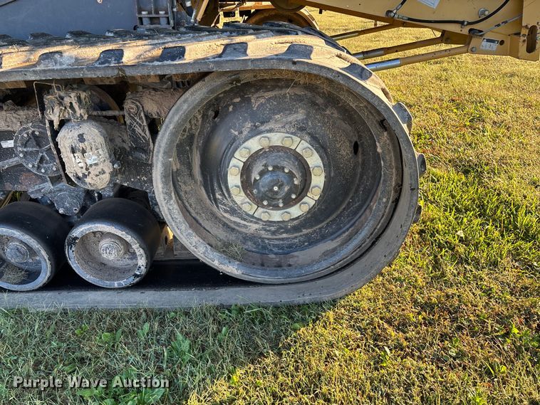 image for item ED2302 1999 Caterpillar Lexion 465 RWA combine