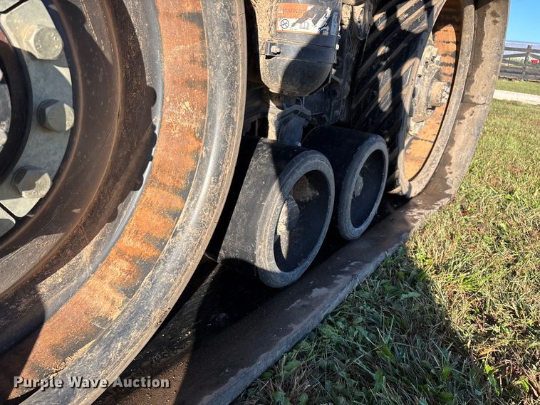 image for item ED2302 1999 Caterpillar Lexion 465 RWA combine