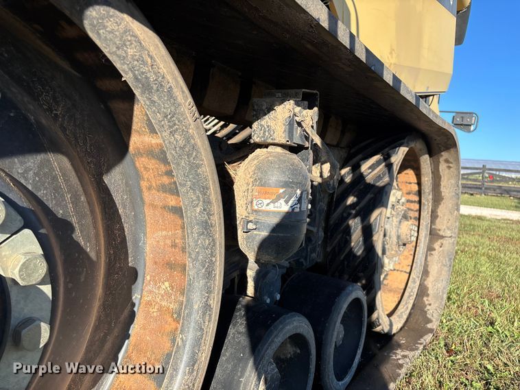 image for item ED2302 1999 Caterpillar Lexion 465 RWA combine