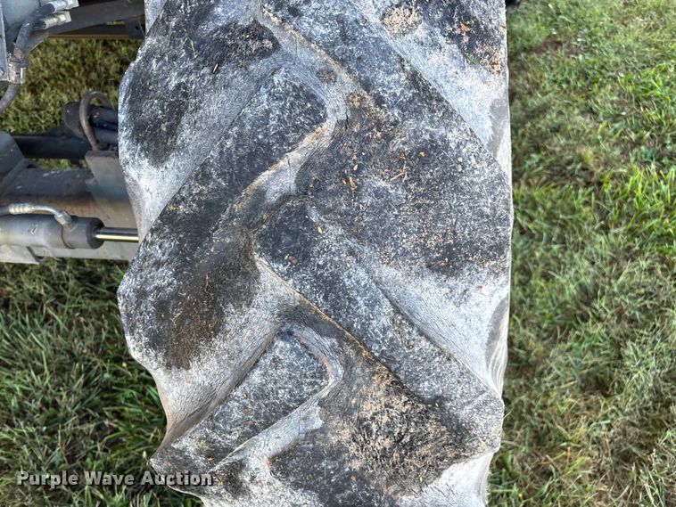 image for item ED2302 1999 Caterpillar Lexion 465 RWA combine