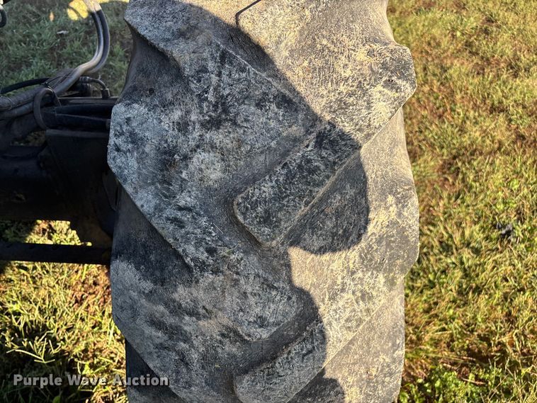 image for item ED2302 1999 Caterpillar Lexion 465 RWA combine