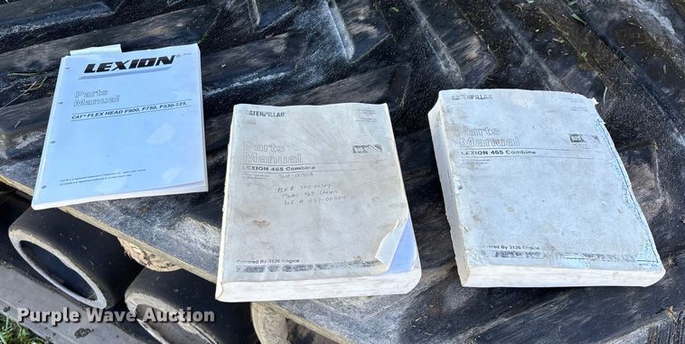 image for item ED2302 1999 Caterpillar Lexion 465 RWA combine