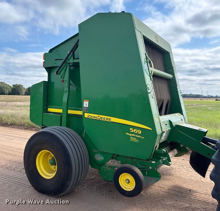 image for item EM8371 2015 John Deere 569 Mega Wide Plus round baler