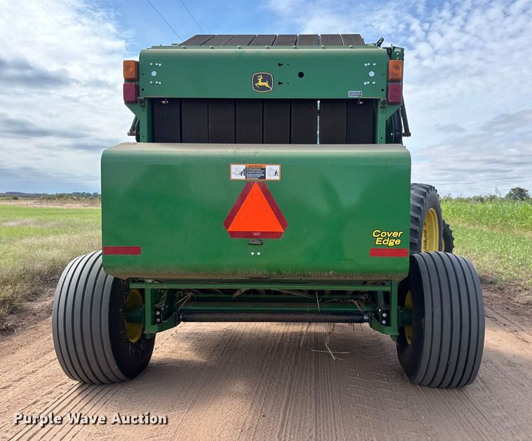 image for item EM8371 2015 John Deere 569 Mega Wide Plus round baler