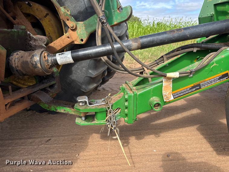 image for item EM8371 2015 John Deere 569 Mega Wide Plus round baler