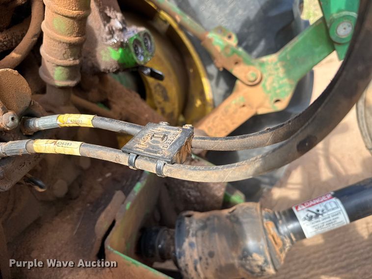 image for item EM8371 2015 John Deere 569 Mega Wide Plus round baler