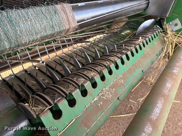 image for item EM8371 2015 John Deere 569 Mega Wide Plus round baler