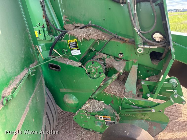 image for item EM8371 2015 John Deere 569 Mega Wide Plus round baler