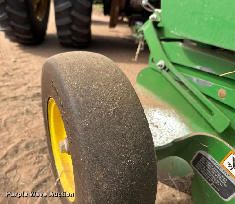 image for item EM8371 2015 John Deere 569 Mega Wide Plus round baler