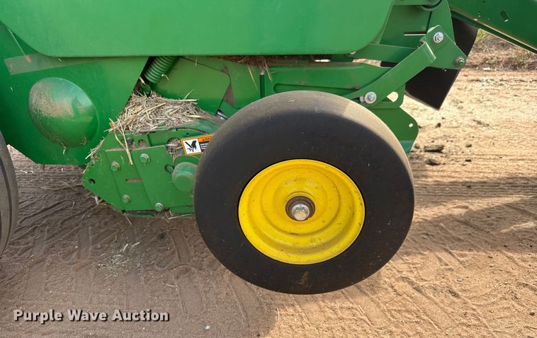 image for item EM8371 2015 John Deere 569 Mega Wide Plus round baler