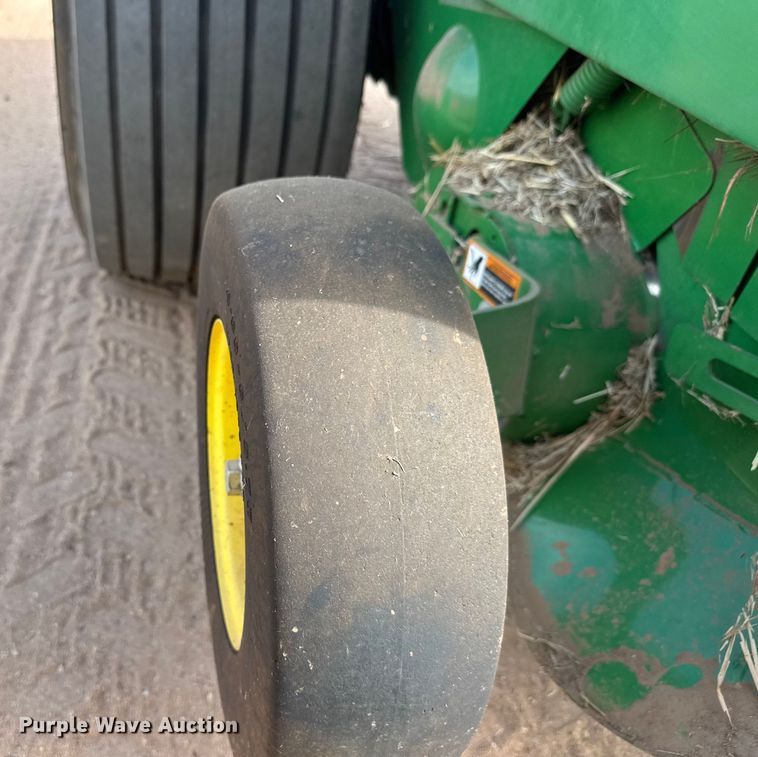image for item EM8371 2015 John Deere 569 Mega Wide Plus round baler