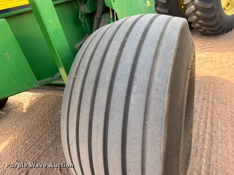 image for item EM8371 2015 John Deere 569 Mega Wide Plus round baler