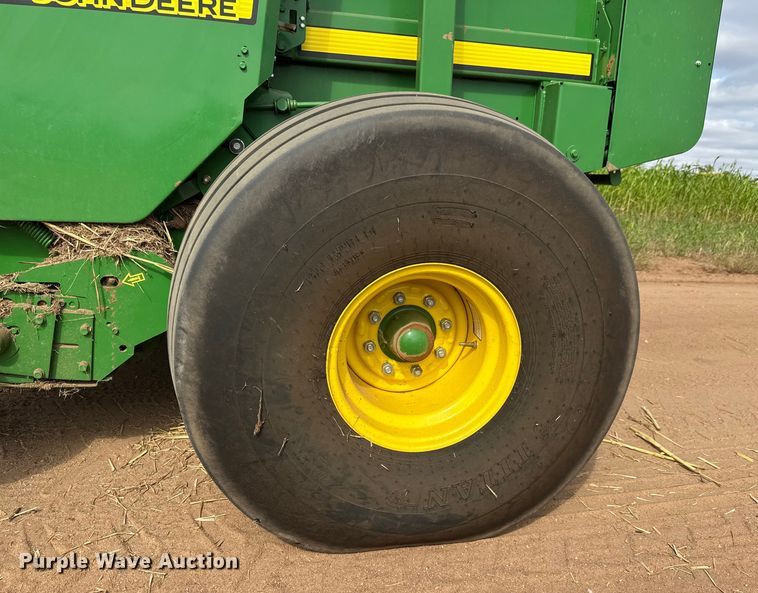 image for item EM8371 2015 John Deere 569 Mega Wide Plus round baler