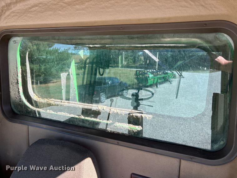 image for item YA1346 1999 John Deere 9510 Maximizer RWA combine