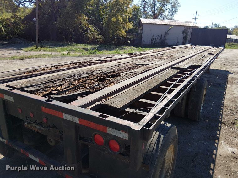 image for item DU3646 1986 Transcraft TL100K-48 flatbed trailer