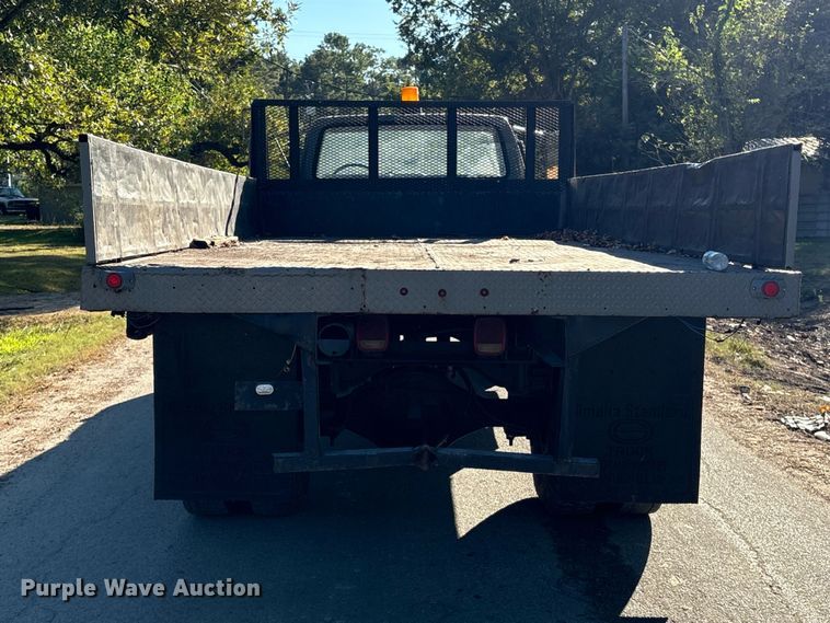 image for item EA6995 1985 Ford F700 dump flatbed truck