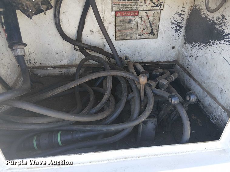 image for item EC1215 1996 International 4700 utility / service truck