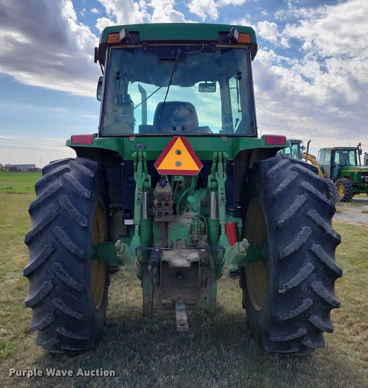 image for item EA2662 2001 John Deere 7210 MFWD tractor
