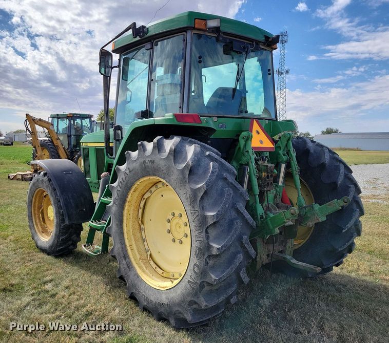 image for item EA2662 2001 John Deere 7210 MFWD tractor