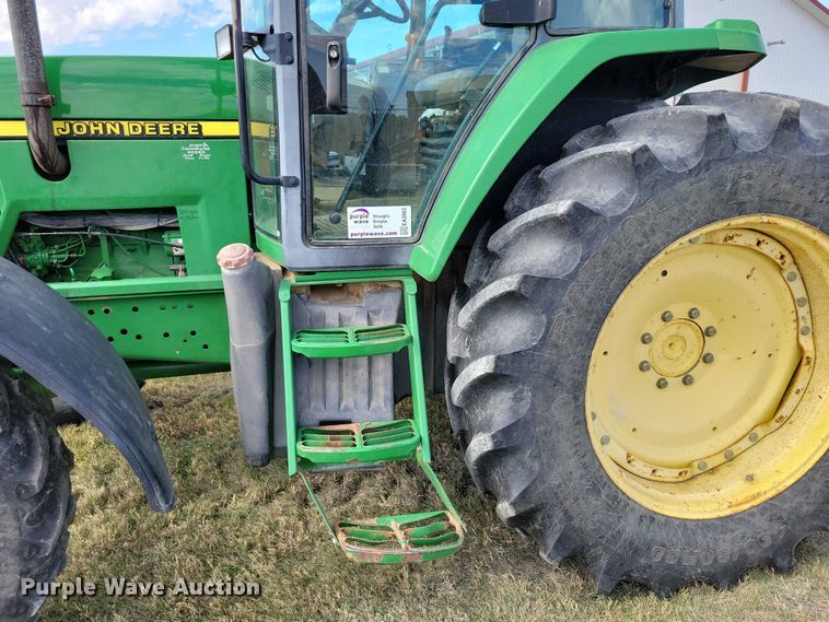image for item EA2662 2001 John Deere 7210 MFWD tractor