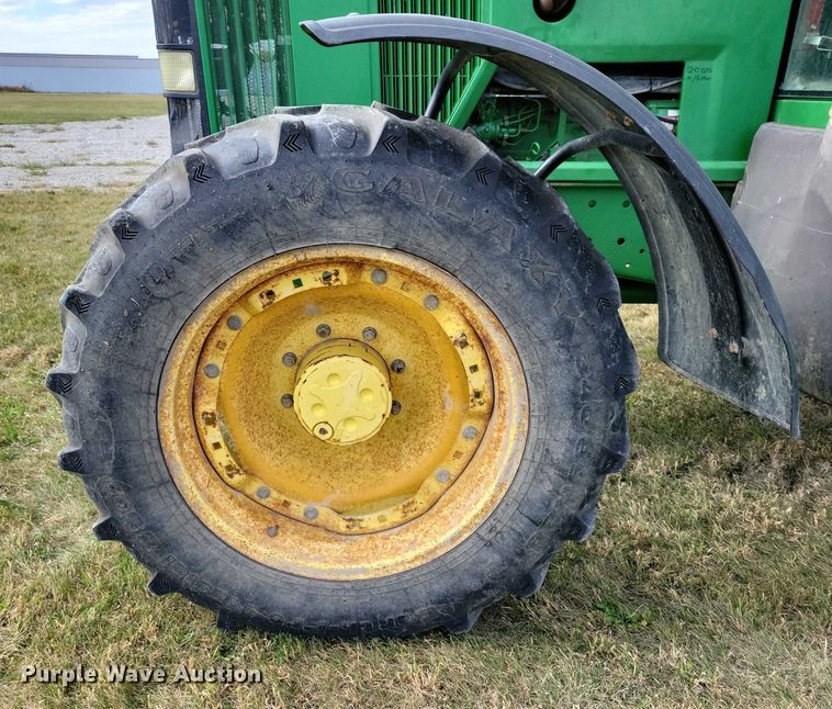 image for item EA2662 2001 John Deere 7210 MFWD tractor