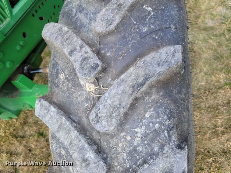 image for item EA2662 2001 John Deere 7210 MFWD tractor