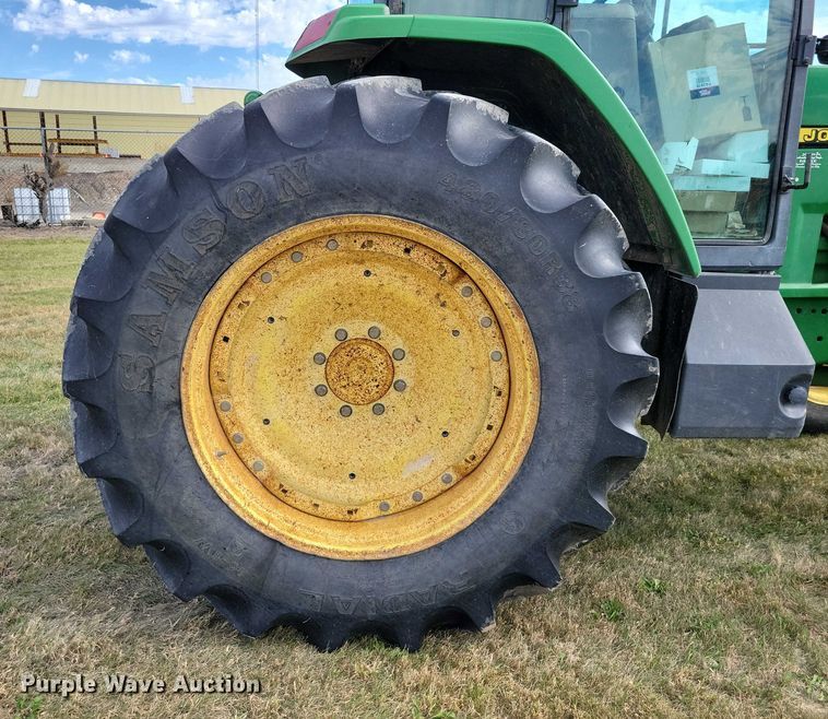 image for item EA2662 2001 John Deere 7210 MFWD tractor