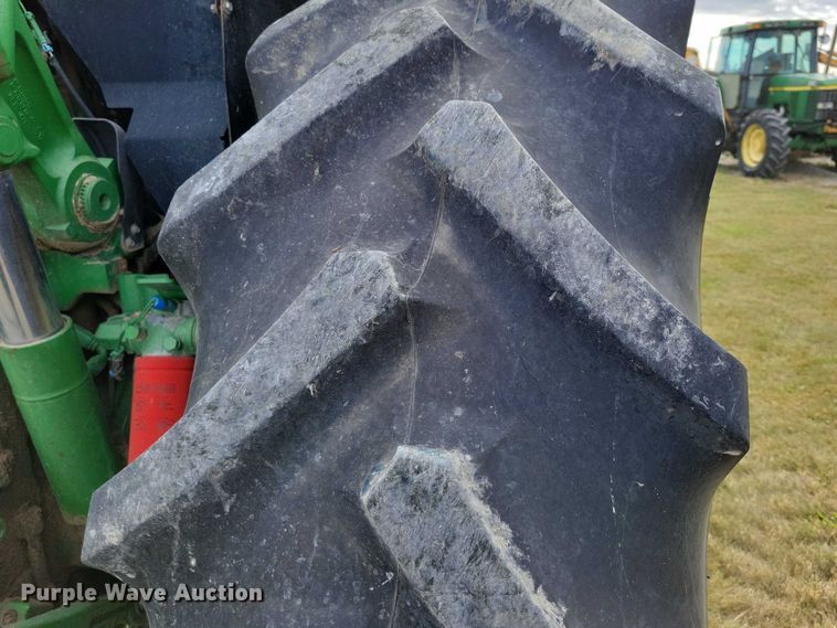 image for item EA2662 2001 John Deere 7210 MFWD tractor