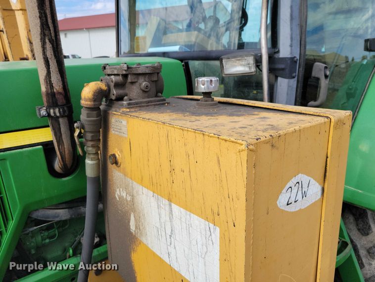 image for item EA2663 2001 John Deere 7210 MFWD tractor