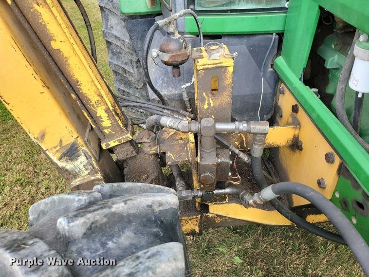 image for item EA2663 2001 John Deere 7210 MFWD tractor