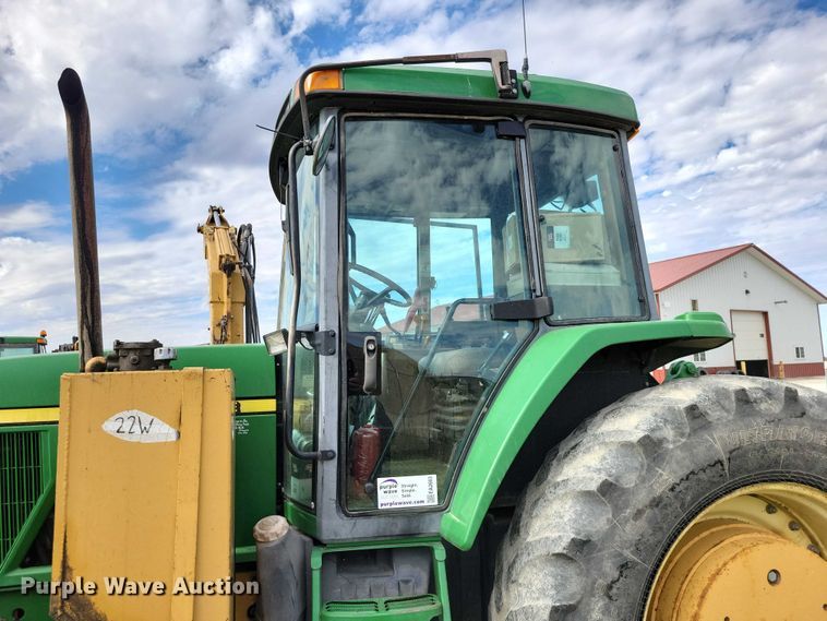 image for item EA2663 2001 John Deere 7210 MFWD tractor
