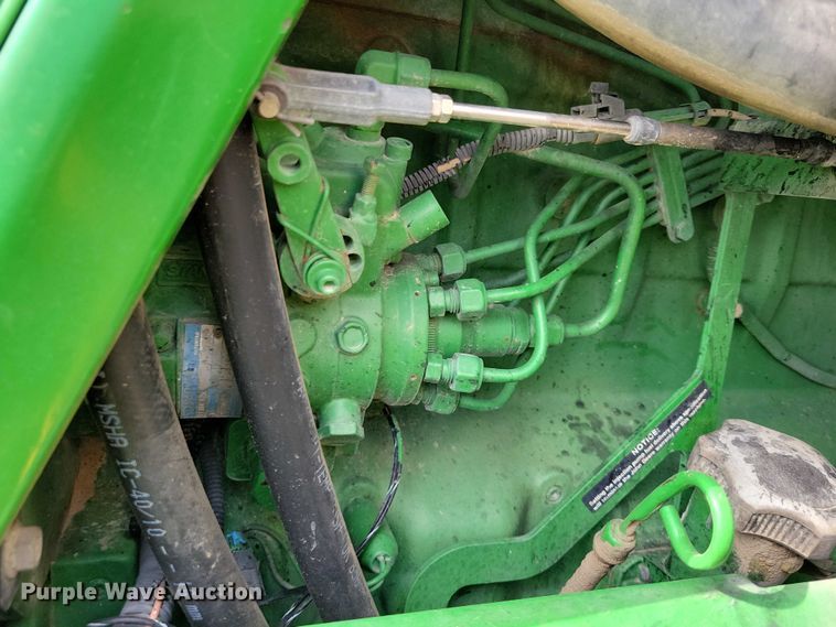image for item EA2663 2001 John Deere 7210 MFWD tractor