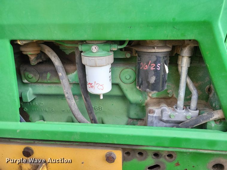 image for item EA2663 2001 John Deere 7210 MFWD tractor