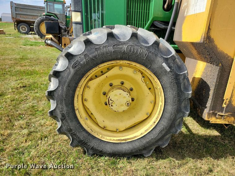 image for item EA2663 2001 John Deere 7210 MFWD tractor