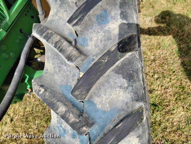 image for item EA2663 2001 John Deere 7210 MFWD tractor