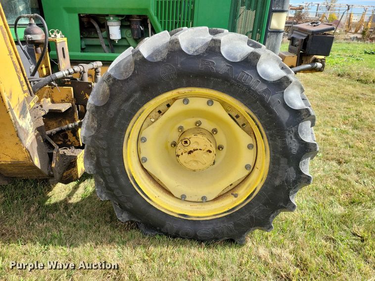 image for item EA2663 2001 John Deere 7210 MFWD tractor