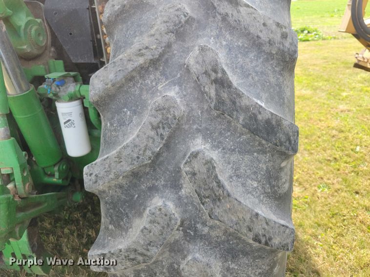 image for item EA2663 2001 John Deere 7210 MFWD tractor