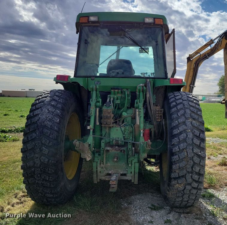 image for item EA2664 2001 John Deere 7210 MFWD tractor