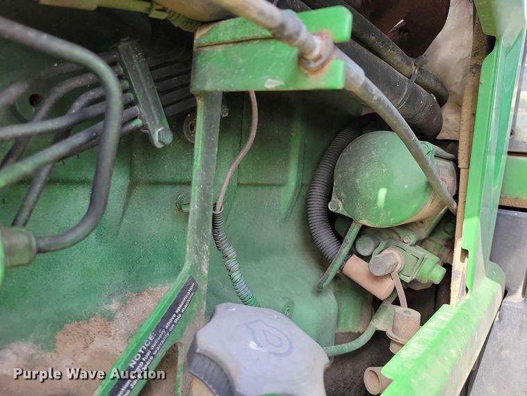 image for item EA2664 2001 John Deere 7210 MFWD tractor