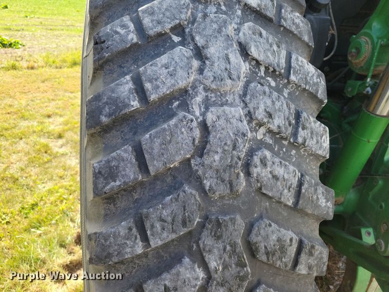 image for item EA2664 2001 John Deere 7210 MFWD tractor