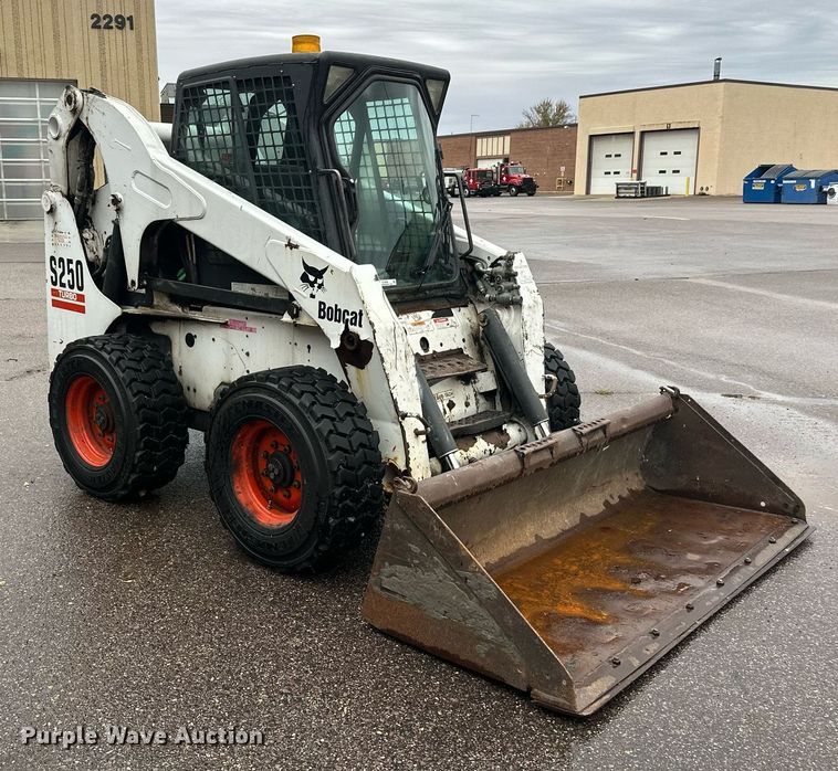 MINI CARGADOR SOBRE RUEDAS 2004 BOBCAT S250